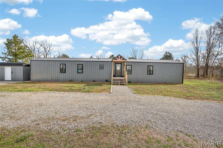 Enjoy the perfect blend of privacy, convenience, and modern updates with this beautifully renovated 3-bedroom, 2-bath home situated on just under 1 acre. Tucked away on a corner lot for peaceful country living, this property still offers quick and easy access to I-44 and nearby amenities. Nearly every inch of this home has been thoughtfully updated within the last two years, including a NEW roof, siding, windows, and flooring—giving you peace of mind and a move-in-ready experience. The kitchen features BRAND-NEW stainless steel appliances, adding a sleek, modern touch to the space. Outside, you’ll find an NEWLY CONSTRUCTED, fully finished, detached building that opens the door to endless possibilities—perfect for a hobby space, workshop, home office, or even a homeschooling setup. Located in the desirable Joel E. Barber School District, this property combines modern updates, usable space, and a convenient location—all at an affordable price point. This is a great opportunity for those looking for move-in-ready living with room to make it their own.