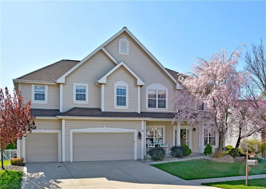 Prepare to be "WOWed"! This two story 5BR/4BA has all the bells and whistles, starting w/an OPEN FLOOR PLAN and 4000+ sq.ft of living space. Beautifully maintained and decorated, you are greeted by the FORMAL LIVING AND DINING AREAS, and a large FAMILY ROOM featuring a wood burning fireplace w/marble surround, a wall of windows overlooking the back yard, ceiling fan and REAR STAIRCASE. The KITCHEN was REMODELED in 2010, and boasts 42" WHITE CABINETS w/over and under cabinet lighting, GRANITE, ceramic backsplash, SS APPLIANCES, crown molding, WOOD FLOORS, canned lighting, planning desk and beautiful vaulted SUN ROOM. Upstairs is a large MASTER SUITE w/walk in closet and MASTER BATH w/garden tub, sep. shower, double sinks w/vanity seating and linen closet. A large BONUS ROOM and three generous BR's finish the upstairs. The fenced back yard is an entertainer's dream, with paver patio and built in gas fire pit. Also incl. are newer roof, sprinkler and alarm system. Won't last long!