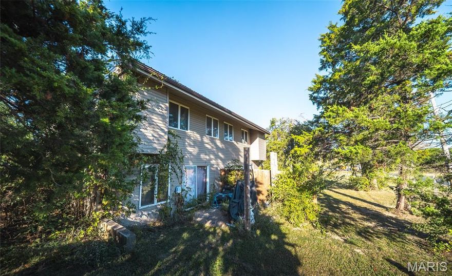 Great investment opportunity! This duplex features two spacious units, each offering 3 bedrooms and 1 bath. One side is currently rented while the other is owner-occupied, providing flexibility for an investor or owner-occupant. Property includes a carport and sits on 3 beautiful acres, offering plenty of outdoor space and potential for future expansion. Excellent income potential in a peaceful setting!