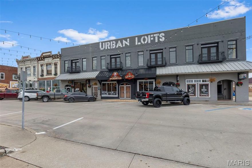 Rare opportunity to acquire a multi tenant, mixed use property totaling over 20,000 square feet, ideally located on the square in downtown Perryville. This beautifully designed property features eight residential units, with a mix of short term rentals currently operating as Airbnbs and long term residential leases, offering diversified income streams.
The property also includes four fully leased commercial units that have seen extensive improvements, including major structural updates such as electrical and HVAC systems, providing peace of mind for future ownership. Positioned in a prime downtown location with strong visibility and consistent tenancy, this is an exceptional investment opportunity with established cash flow and long term upside.
