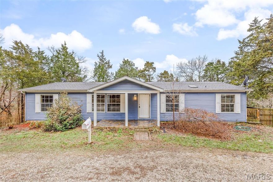 Looking for space, privacy, and acreage? This four-bedroom, two-bath home sits on 8.5 acres in a peaceful rural setting, offering a comfortable blend of country living and everyday convenience. The quiet surroundings provide plenty of room to spread out and enjoy nature while still being within a reasonable drive to nearby amenities. A detached two-car garage with electric and side entry offers great space for vehicles, storage, or hobbies. The home is equipped with a Generac automatic standby generator that powers the home during electrical outages, providing added peace of mind year-round. All appliances stay, including the refrigerator, washer, and dryer. The property also includes a one-year Ultimate Choice Plus home warranty. This is a great opportunity to enjoy a tranquil countryside setting and to make it your own.