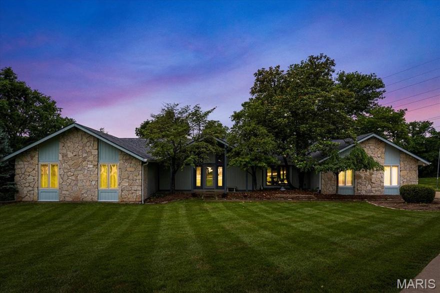 OPEN HOUSE CANCELED due to PENDING status. Welcome to this custom-built, one-owner ranch home nestled on a tranquil cul-de-sac in Town & Country. This residence, meticulously maintained and thoughtfully updated, offers sophisticated living on a private, nearly three-quarter-acre wooded lot with a custom saltwater pool. Step inside and be captivated by the vaulted great room, where a floor-to-ceiling stone fireplace serves as a dramatic centerpiece. This space flows effortlessly into an updated kitchen and breakfast room with direct access to the sparkling pool. A den with a wet bar and built-in bookcases provides a quiet retreat, while the vaulted sunroom with cozy gas fireplace and tongue-and-groove ceiling opens to a private deck and pool area.This residence features a smart layout with 5 bedrooms and 3.5 bathrooms. The main level hosts the primary suite and three secondary bedrooms. The finished, walk-out lower level provides additional living space with a rec room, fifth bedroom, a full bathroom, and ample storage—making it an ideal space for guests, a home gym, or a dedicated entertainment area. The large saltwater pool includes an elevated lounge platform with a custom water feature. An attached two-car garage and main-level laundry room add to the home’s convenience. Significant recent updates, including the roof, many of the home’s mechanics, and the pool's foundation and liner, offer peace of mind. This is more than a home; it's a lifestyle waiting for you to enjoy.