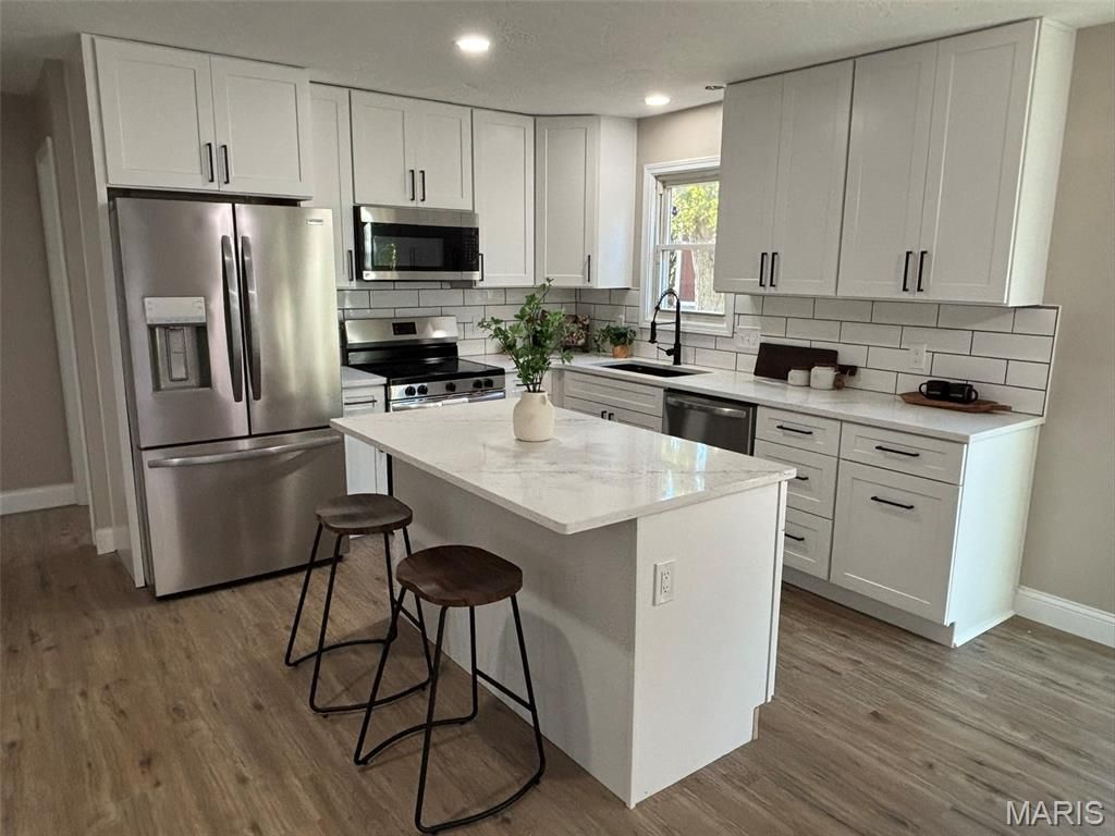 Photo of 11849 Northport Drive, Florissant, MO 63033 (MLS # 25073230)