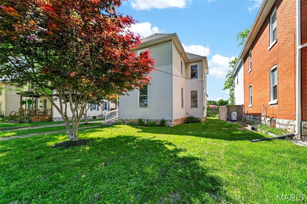 Photo of 1009 S 4th Street, St Charles, MO 63301 (MLS # 26023773)