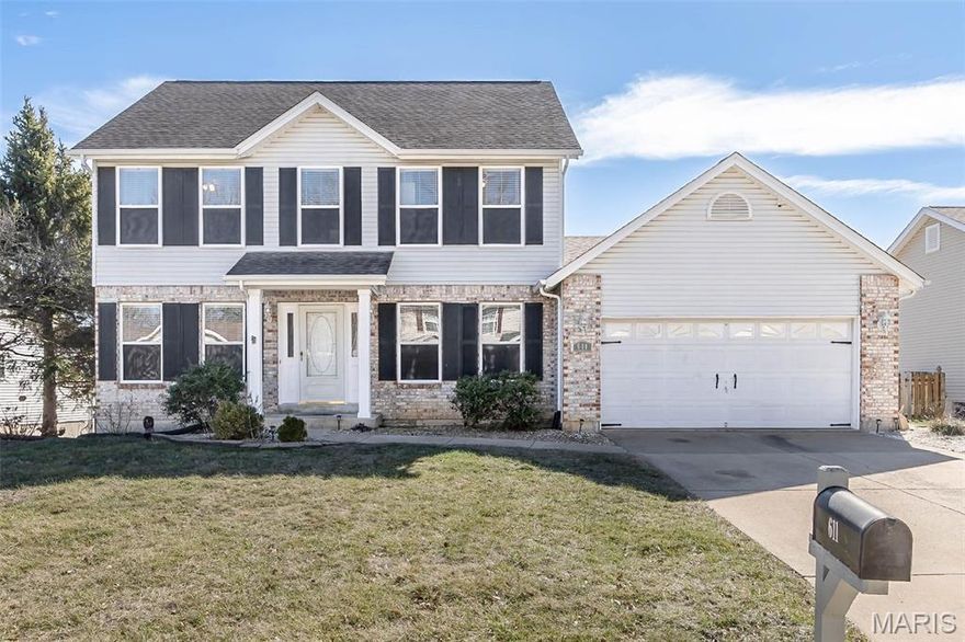 Welcome to 611 Bennington Drive in highly sought after Monticello Estates -  a move-in ready home offering space, comfort, and thoughtful updates throughout! Step inside to find a versatile front living room, perfect as a sitting area or private home office. The spacious family room features newer carpet and a stunning gas fireplace with floor to ceiling brick, perfect for relaxing evenings on the couch. The formal dining room is ready to host holiday gatherings and dinner parties with ease. The eat-in kitchen is designed for both function and style, showcasing a large sink, stainless steel appliances (new oven range Oct 2025), and a center island with beautiful butcher block countertop, ideal for meal prep.

Upstairs, retreat to the expansive primary suite highlighted by charming bay windows that fill the room with natural light. The updated primary bath features gorgeous tilework, double vanities, a jetted tub, and a custom shower for a spa-like experience.

The nicely finished lower level offers an L-shaped rec room, perfect for entertaining, movie nights, a game room, or a home gym. Rough-in is ready for your lower level bathroom to be built, and you’ll appreciate the dedicated workshop area along with abundant storage space. A new basement slider was installed in October 2025.

Outdoors, enjoy summer evenings in the fully fenced, level backyard. The newer Trex decking and handrails create a low-maintenance space for relaxing or entertaining. The fully insulated garage adds year-round comfort, and the attic space above is wired with lighting, providing additional storage.

This beautifully maintained home blends functionality, updates, and charm - all in a fantastic location. Don’t miss your opportunity to make it yours!