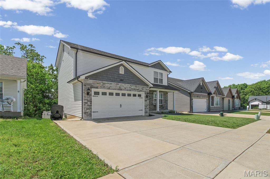 Photo of 1967 Masters Drive, Festus, MO 63028 (MLS # 26026404)