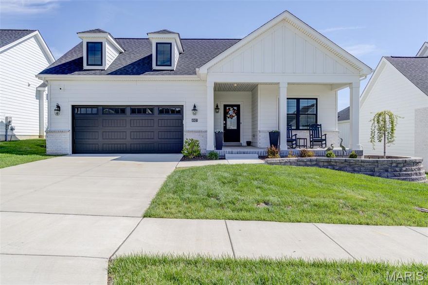 Welcome home to this stunning villa!  It's the Promenade Elev B model, very elegant w/tons of upgrades.  The spacious open floorplan offers a formal entryway, an amazing kitchen w/ a large island opening into the dining area & great rm w/ a lovely gas f/p & wall of windows overlooking a private courtyard; a private owner's suite w/ w-i closet & beautiful bath sporting a zero threshold shower, dbl sinks & water closet; a guest bdrm & 2nd bath; a den/office; a spacious laundry rm w/ sink & cabinets; a full bsmt w/lookout window & an O/S, insulated 2-car garage w/epoxied floor. Some more of the xtras include an inviting front porch, 9' ceilings, tray ceilings, Pella windows, quartz counters, SS appliances, LOTS of upgraded kitchen cabinets, w-i pantry, luxury vinyl plank & marble flooring, ceiling fans, panel doors, lever style handles, custom shades, plantation shutters, lots of storage & more! This community has nature trails & a 15-acre lake to enjoy! Great location -- close to highways & shopping.