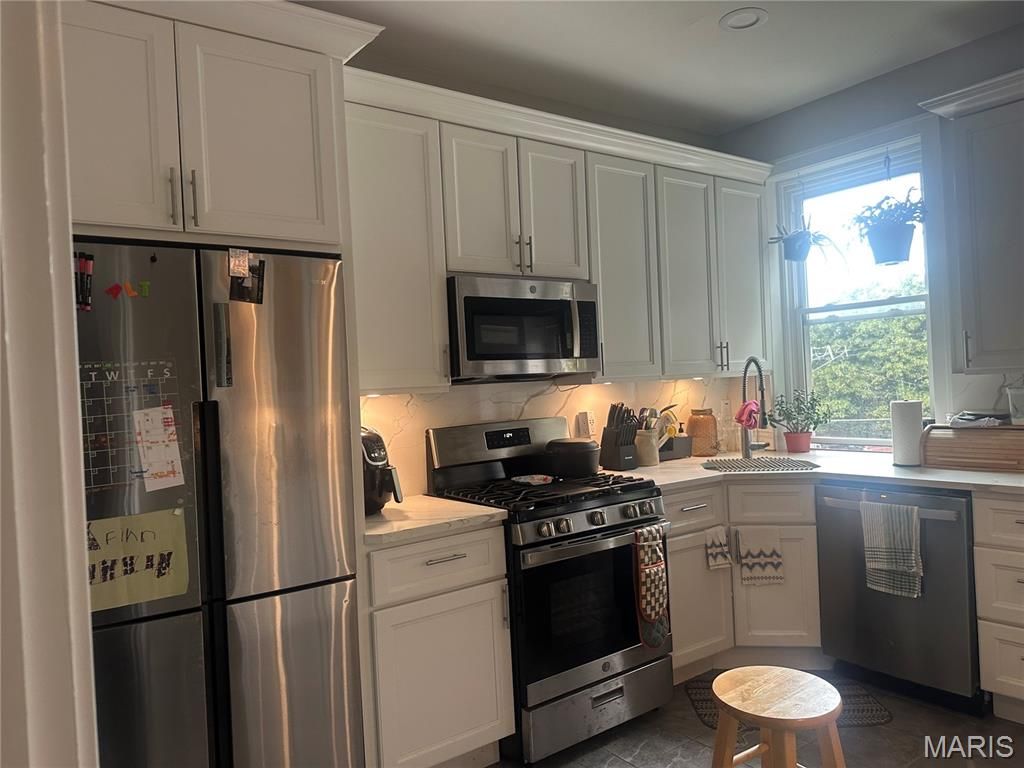 Photo of 4009 Hartford Street, St Louis, MO 63116 (MLS # 25070413)