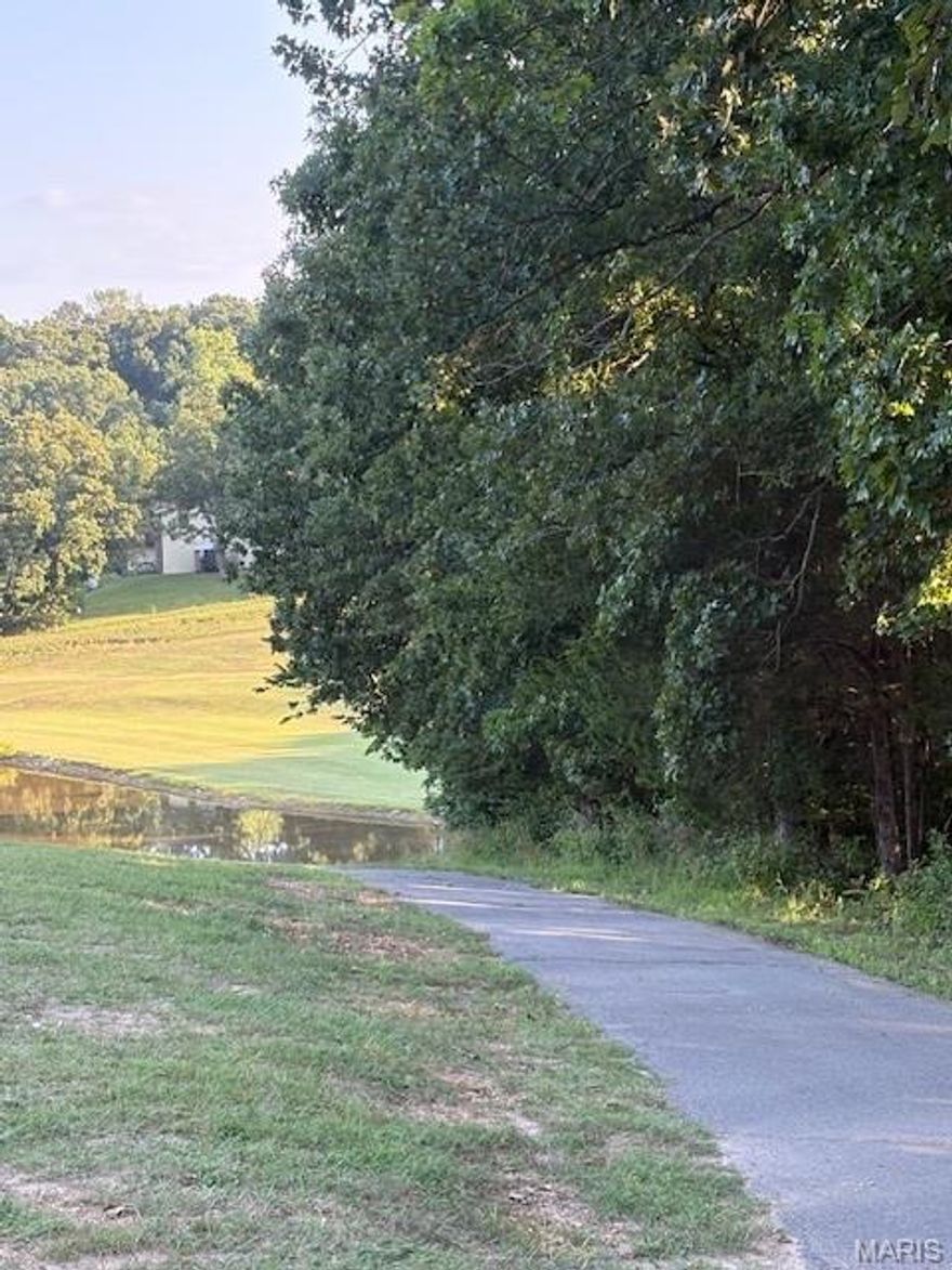 Build Your Dream Getaway Near Autumn Lake on Raintree Backing to Raintree Golf Course!   Whther you're looking to build your dream home or simply enjoy the perks of ownership, this lot offers exceptional value and access to everything Raintree Plantation has to offer. Located in walking distance to the Country Club and Golf Coure, the perfect location near the rear gate.

Live like you're on vacation every day with resort-style amenities, including:

4 private community lakes for fishing, boating, kayaking

Beaches, swimming, and scenic lake views

Golf course, country club, and on-site restaurant

Hiking, biking trails, campgrounds, and sand volleyball

A golf cart-friendly community for relaxed neighborhood living

Ownership includes access to the Country Club for just $271/year, and full community amenities for only $250/year. All of this just 35 minutes from South County (63128)!

See all photos for a glimpse into the incredible Raintree lifestyle. As a resident myself, I can confidently say: it’s an amazing place to live, play, and relax. Come join us!