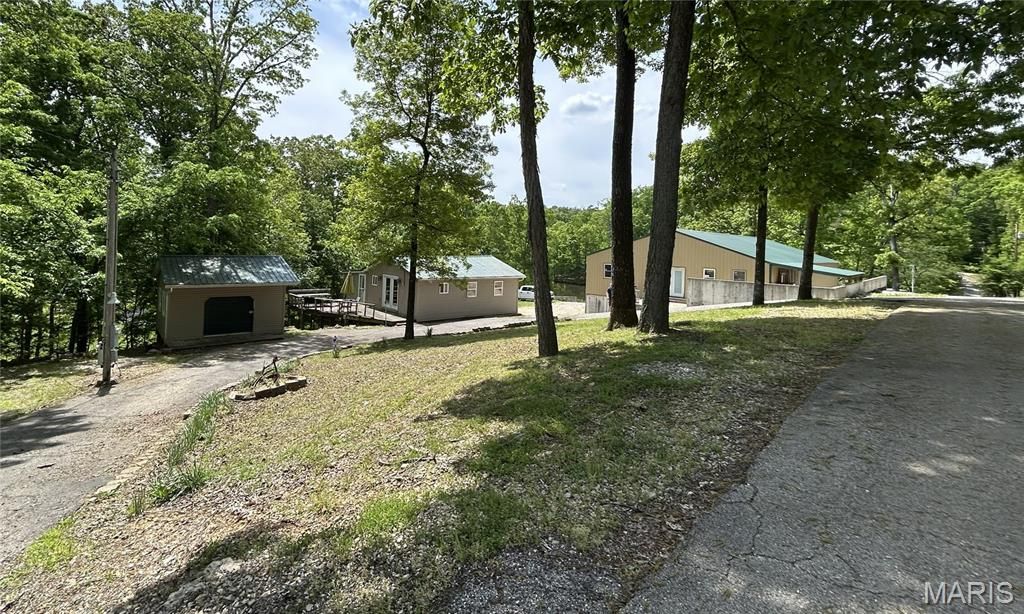 Photo of 438 Little Dogwood Lake Road, Burfordville, MO 63739 (MLS # 26026461)