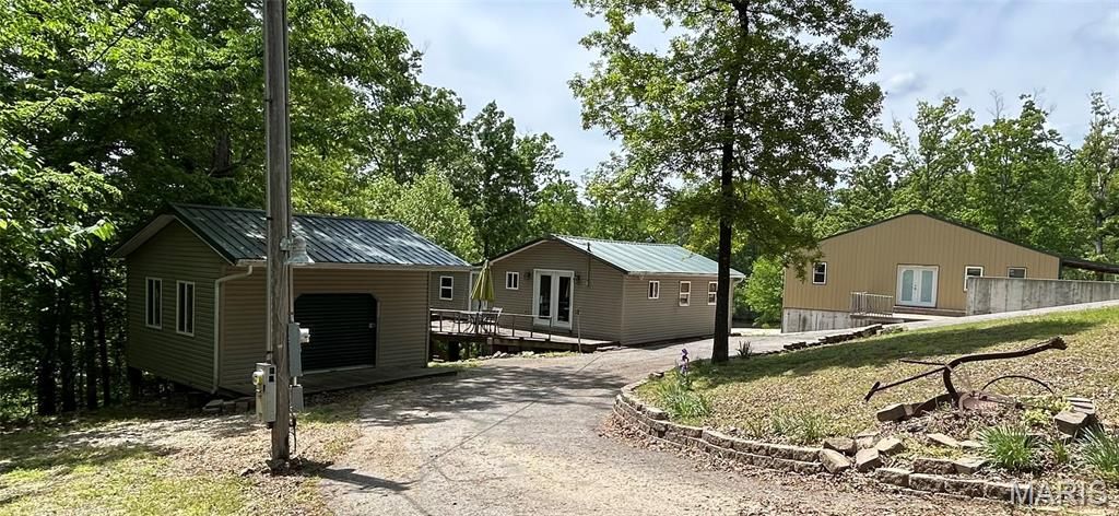 Photo of 438 Little Dogwood Lake Road, Burfordville, MO 63739 (MLS # 26026461)