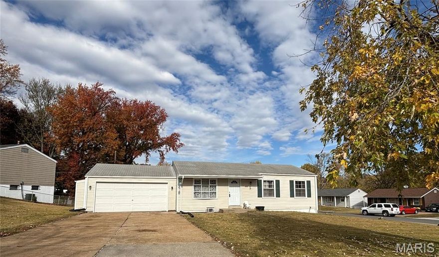 Clean, updated, and move in ready!  This outstanding ranch sits on a large corner lot with almost 1/3 acre!  Home features three generous bedrooms with extra closet space; refinished hardwood flooring throughout living room, hallway and bedrooms; updated, eat-in kitchen with custom backsplash and newer appliances; newer windows and vinyl siding; oversized 2 car garage with newer door and opener; additional storage area off garage; clean and open basement with newer electric panel, hvac, and hot water heater is ready to be customized to fit your needs.  Conveniently located, near highways, public transit, dining and shopping.  Make this your home today!