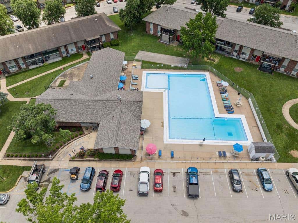Photo of 9047 Villaridge Court #F, Unincorporated, MO 63123 (MLS # 26035772)