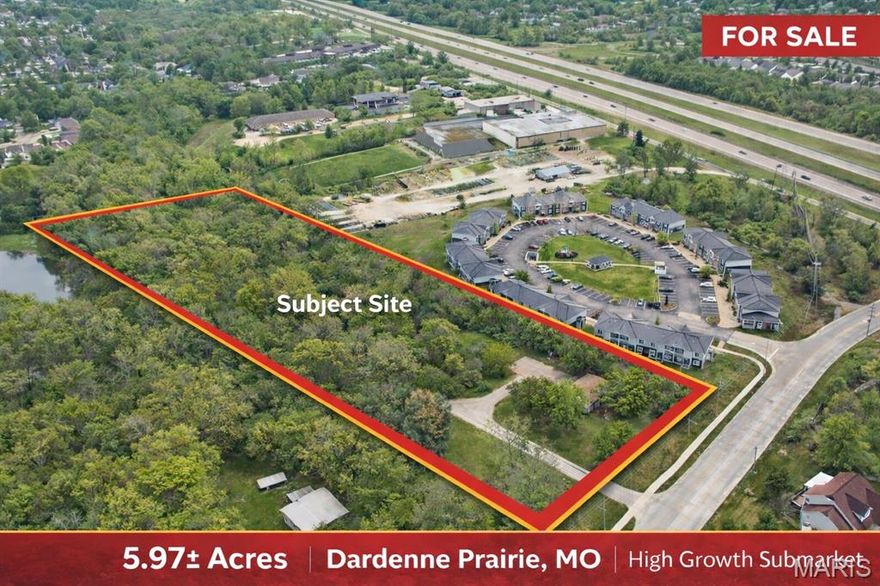 Prime 5.97± Acre Development Opportunity | Dardenne Prairie, MO

Rare opportunity to acquire 5.97± acres of flat, level ground in the highly desirable Dardenne Prairie submarket. The property offers approximately 265 feet of road frontage and access to public utilities, including sewer, water, electric, and natural gas, providing a strong foundation for future development.

Currently zoned residential, the site presents excellent potential for redevelopment, including single family residential or other uses, subject to rezoning. Located within FEMA Flood Zone X, the property is considered outside of high-risk flood areas, enhancing its overall development appeal.

Positioned with convenient access to major corridors including Highway 364, I-64/40, and I-70, the property benefits from strong regional connectivity and proximity to established residential communities, retail, and continued area growth.

The site offers a highly usable footprint, allowing flexibility in planning and layout. Buyers are encouraged to perform their own due diligence regarding zoning, density, and development feasibility.