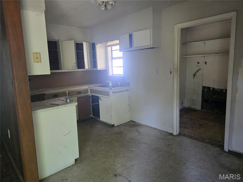 Photo of 105 Adams Street, Sikeston, MO 63801 (MLS # 26027665)