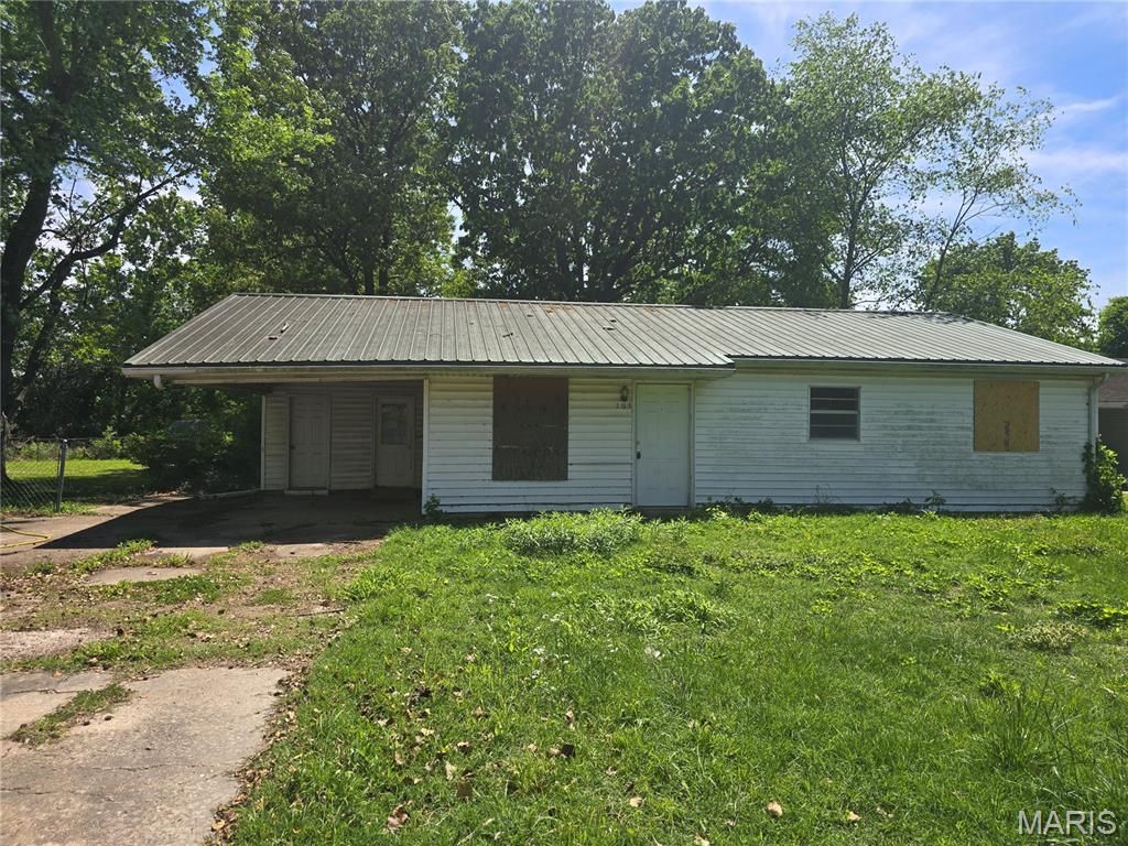 Photo of 105 Adams Street, Sikeston, MO 63801 (MLS # 26027665)
