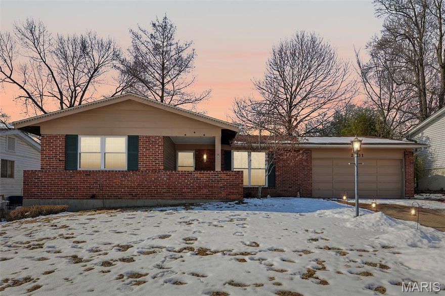 Single-story home with finished lower level on a 0.173-acre lot in Maryland Heights. Main level offers 3 bedrooms and 2 full baths, including a primary bedroom with private bath. Separate living room at the front of the home and a rear family room with wood-burning fireplace and large windows for natural light. Kitchen features wood cabinetry, solid surface counters, stainless steel appliances (updated in recent years), gas range, microwave, dishwasher, refrigerator, center island with butcher block countertops, and window over the sink. Dining area connects directly to the family room, creating an open flow between kitchen, dining, and living spaces while maintaining defined rooms. Interior has been freshly painted. Main level includes updated flooring, multiple storage closets, and functional layout with bedroom wing separated from main living areas.
Finished lower level adds substantial living space with large recreation room, dedicated sleeping area with walk-in closet, unfinished laundry area, and additional storage.  Exterior includes brick front elevation, covered front porch, attached 2-car garage, driveway parking, patio area, and fully fenced backyard.  Major systems: Roof (2012), furnace (2020), water heater (approx. 2–3 years old). 
Located approximately 2.3 miles to I-270 and 6 miles to I-70 for regional access. Approximately 1.4 miles to the Dorsett Road retail corridor including grocery, coffee shops, and dining; about 1.3 miles to Maryland Heights Community Center; about 3 miles to Westport Plaza; and about 2.0 miles to Creve Coeur Park and the Creve Coeur Lake trail system.

Includes 3D walkthrough, virtual tour and SkyTour for interactive viewing.