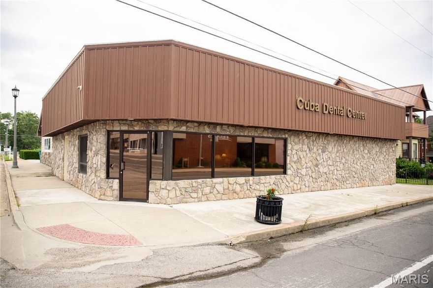 HUGE investment opportunity with PRIME location in the heart of Cuba, MO, also known as the floating capital of Missouri, and Mural City, bringing in tens of thousands of tourists all year around! Priced well below appraised value. This expansive commercial building, formerly a Dental Center, offers a versatile space with endless possibilities. Boasting over 4,000sq. ft, the property includes five private offices, a welcoming lobby, and a potential comfortable living quarters. High visibility right off Historic Route 66. BONUS FEATURE - this building does provide a full kitchen, full bathroom, and bonus room that can easily be converted to living quarters. With all of this space, on site management could be an added feature. Potential use is endless, multi-tenant office building, a specialized medical facility, beauty salon, or retail center. This opportunity is just waiting for the new set of owners to take advantage of. Schedule your private showing today and explore the endless opportunities this building has to offer!