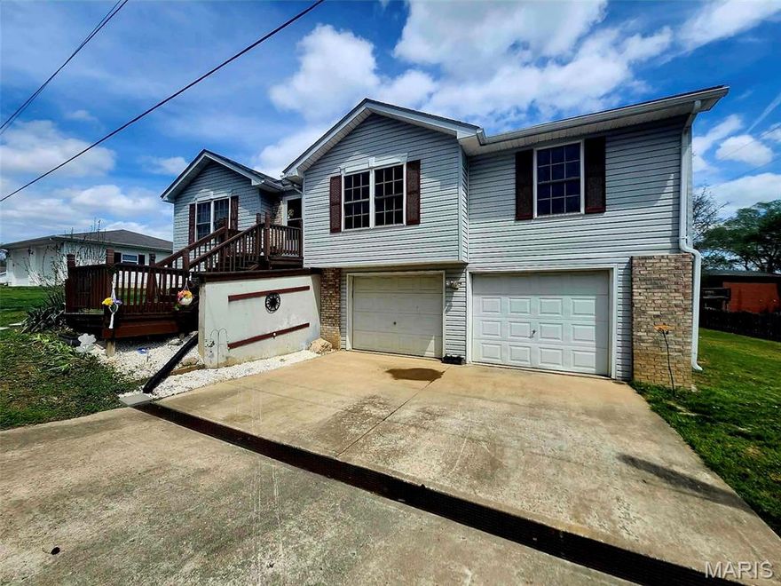 Check out this great 3 bed 2 bath home on the outskirts of Elsberry. This home would make a great 1st time home and features a nice view off the back overlooking the Mississippi river bottoms. This home is also wheelchair accessible. The ramp going from the front to the back deck will stay with the sale of the home. Since the home is conveniently located just a minute from Hwy 79 you can be in the O'Fallon in just minutes!