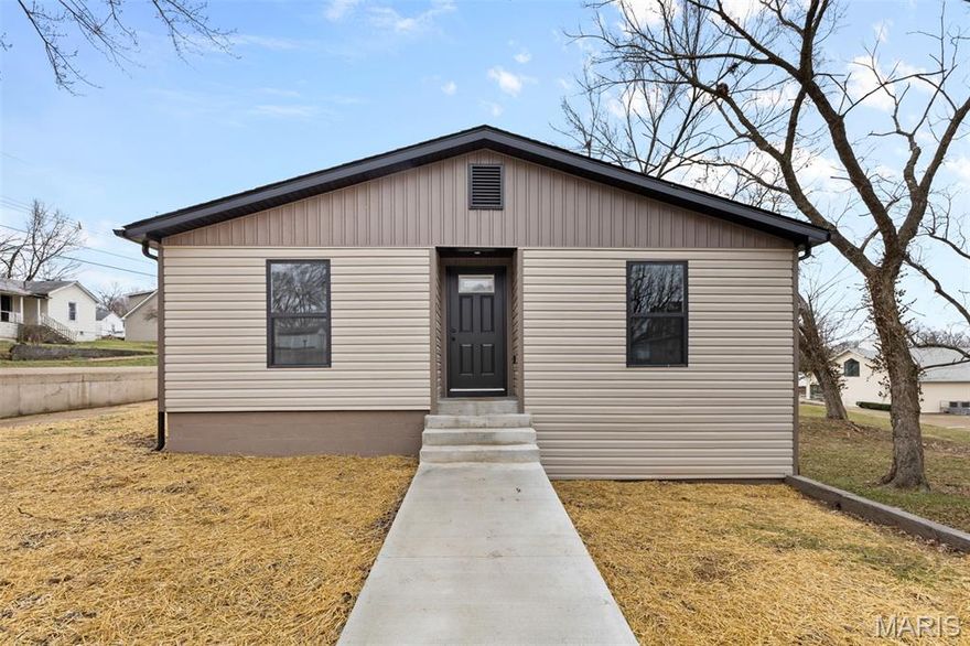 Welcome to this charming 3 bedroom 2 bath bungalow that perfectly blends comfort and potential! Situated on a spacious lot, this home features is beautifully remodeled with a large kitchen, equipped with plenty of cabinets for all your storage needs. The unfinished basement offers endless possibilities, perfect for creating additional living space, a workshop, or a recreational area. Enjoy the quaint appeal of bungalow living, with the added bonus of outdoor space for gardening or entertaining. Don't miss the chance to make this adorable home your own! Seller is offering a Home Warranty.