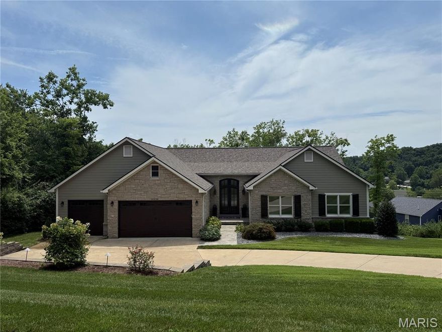 Stunning ranch home that truly shows like a display, perfectly blending style, comfort, cozy, functionality & gorgeous! 
Featuring 4 bedrooms, 3 full baths, 2 half baths, walk in closets, curved drywall corners throughout, extra high ceilings.   expansive living & entertaining spaces, this home has it all.
The large gourmet kitchen is a showstopper with stainless steel appliances, custom cabinetry, gas stove, oversized island, hard surface countertops, large laundry room & the most beautiful barn door you have ever seen! The kitchen opens to the cozy hearth room—boasting one of the three beautiful fireplaces in the home—you also have direct access to the spacious maintenance-free deck overlooking the serene backyard. Just off the kitchen, you'll also find a convenient half bath, laundry/mudroom & large pantry space for everyday ease. 
The main level also includes a welcoming foyer, spacious family room with a gas fireplace, wall of windows, a large formal dining room, the luxurious primary suite with two walk-in closets, two additional bedrooms, a full bath, and generous closet space.
Down the stairs, the finished walkout lower level is designed for fun & functionality, featuring a full bar, recreation area with a pool table & shuffleboard, a spacious fourth bedroom with spa-like full bath, and ample storage.
Step outside to enjoy the covered patio, perfect for entertaining or simply relaxing. The oversized 3-car garage provides plenty of room for vehicles & storage. The very best siding and roofing you could desire, high efficiency furnace, even a timer on the exhaust fan, new fixtures, high end, flooring throughout home.
Located in a beautiful setting filled with natural light, this home is truly a rare find. You MUST tour this stately home because it is simply stunning! No showings today or tomorrow- showings can begin Saturday, 12-13-2025