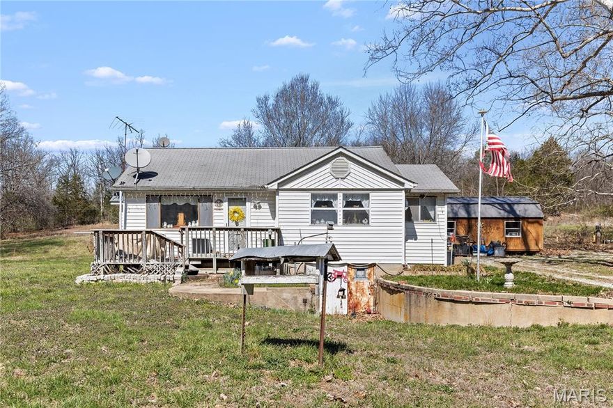 First time to market—welcome to your private retreat at 345 Robin Lane! Tucked away yet conveniently close to town and Highway 44, this unique property offers the perfect blend of peace and accessibility. Set on 5.2 acres, you’ll have room to roam, relax, and truly make the space your own. NO RESTRICTIONS or HOA, makes having all the chickens, goats, and homestead life a breeze! 
Step inside to discover spacious, all main-level living designed with comfort and functionality in mind. While officially a 1-bedroom home, don’t let that fool you—the generous layout offers plenty of flexibility, with ample space to easily create a second bedroom area to suit your needs.
The home features 1.5 bathrooms, a thoughtfully designed kitchen with plenty of room to cook and gather, and storage GALORE throughout. From the basement to the attic, you’ll find no shortage of space to stay organized. The side door has a ramp entrance, NO STEPS! Having owned solar panels helps with affordability! Every inch of this home reflects careful planning and livability, making it an ideal option whether you’re looking for a peaceful full-time residence or a private getaway.
Opportunities like this don’t come along often!