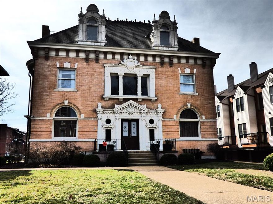This stately mansion, built in 1896, offers more than 8,000 sq/ft for living, business--or both! The building is currently used for offices but the 7BR/5Ba could house a large family and possibly convert the third floor into a 3BR apartment. Special features include a beautiful covered porch off dining area; enormous open foyer with fireplace; ADA wheelchair lift next to parking in back. Space for 2 cars in garage, and 6 on paved part of lot.  Easy walk to shops and restaurants!! Great CWE location.