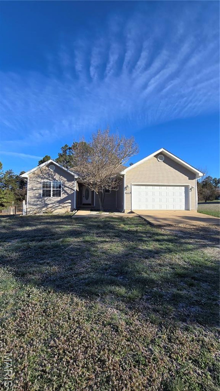 Are you looking for a great home on a nice spacious lot?  This 3 Bedroom 2 Bathroom home sits on a gorgeous 3 Acre Parcel!  Home is spacious!  Formal Dining as well as Breakfast Nook and Bar are a great bonus!!  Bedrooms are spacious!!  Covered back deck. Updated ROOF 2017!!  $5000 Fence installed 2017- This is great for the pups-fence is concreted into ground- No Dig Under!!  There is a shelter for the dogs to get in for weather changes. Great place to have small animals.  Woods behind house have a trail; great for walking or four wheeling.  Trails lead to an open area in the back of lot!  This Home is located just minutes from the South Gate of Fort Leonard Wood!!!  Call today to schedule a showing!! THIS HOME IS A PLATO address in Pulaski County. Plato School District.