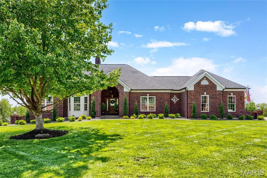 Spectacular brick atrium ranch in beautiful Camelot. This Whittaker-built home features exceptional craftsmanship & distinctive design elements including handscraped hardwoods, soaring ceilings, plantation shutters & expansive windows that offer continuous vista views throughout the home’s interior. Vaulted porch entrance with custom front door with leaded glass panel leads to impressive foyer, formal dining room with detailed trim work, private study and stunning great room with cathedral ceiling & marble fireplace. Designer kitchen with granite countertops, 42” buff cabinetry, KitchenAid appliances & 9’ center island adjoins light-filled breakfast room with groin vault ceiling & atrium door that opens to deck. Primary bedroom suite with wide bay window, customized walk-in closet & spa-inspired bath provides an appealing retreat. A secondary bedroom & hall full bath complete the main floor living quarters. Broad atrium staircase accesses Lower Level entertainment space with recreation room with floor-to-ceiling fireplace, game room & dining area with wet bar plus 3rd & 4th bedrooms & 2 full baths. Situated on a premium 1-acre lot with pool, deck, covered & open patios & 3-car garage.