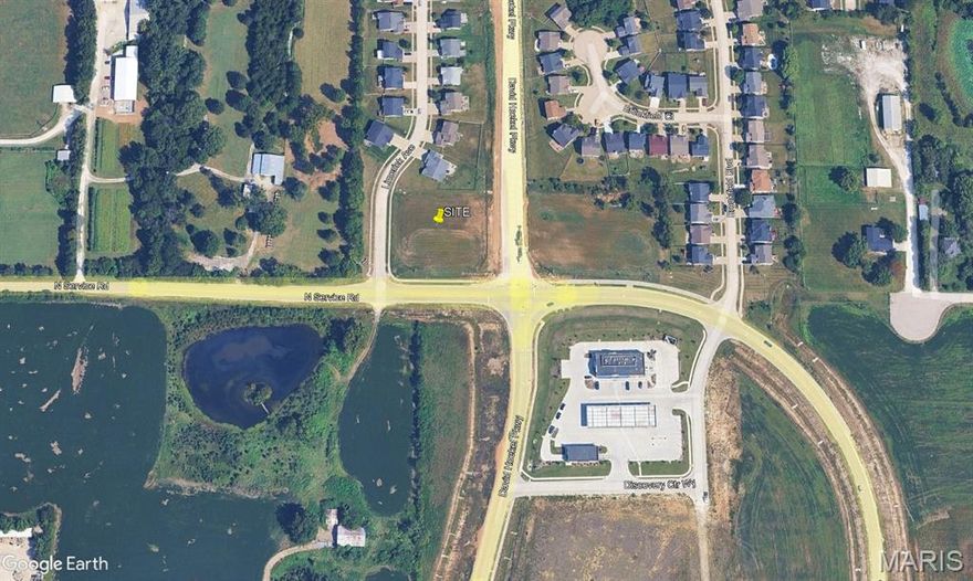 CORNER LOT 400 YARDS FROM I-70 ON RAMP.  LOCATED AT NEWEST WENTZVILLE OVERPASS.  IDEAL FOR QSR, OFFICE.