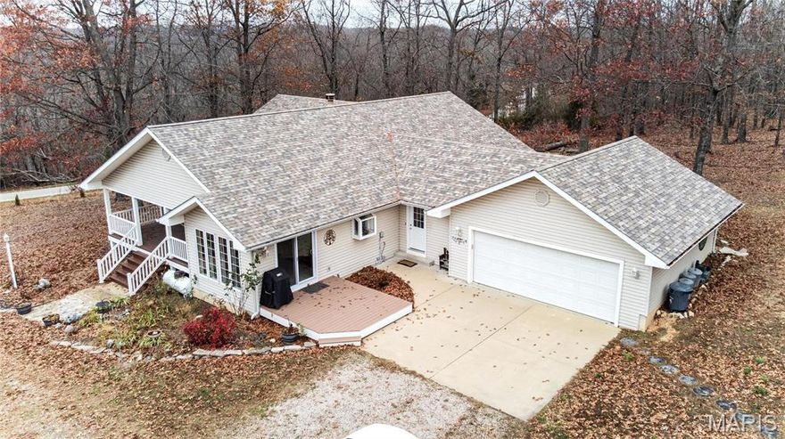 "Pleasant Ridge" Ranch is your new homestead away from the City! There are over 30 acres to enjoy nestled in the woods between Blue Springs Conservation and the Campbell Bridge Access on the Meramec River. This custom-built 3 bedroom, 3.5 bath home offers space, privacy, and a thoughtfully designed layout for comfortable living. On the main level, you’ll find two bedrooms — including the primary suite — and each features its own private outdoor porch, creating the perfect space to enjoy peaceful mornings or unwind in the evenings. The layout of this home is designed to allow you views in two directions so you can take in both sunrises & sunsets. Downstairs, the finished basement includes the third bedroom, which serves as a second primary suite, complete with its own private bath and optional separate entry — making it perfect for multi-generational living, long-term guests, or added privacy.  Outside, there's a fully finished 32x24 outbuilding w/ half bath, electric, and mini-split w/ heating and cooling - ready for your finishing touches. The land is covered with trails, incredible wildlife & a pond. Visit today & take it all in! *New Anderson windows & roof in 2021.