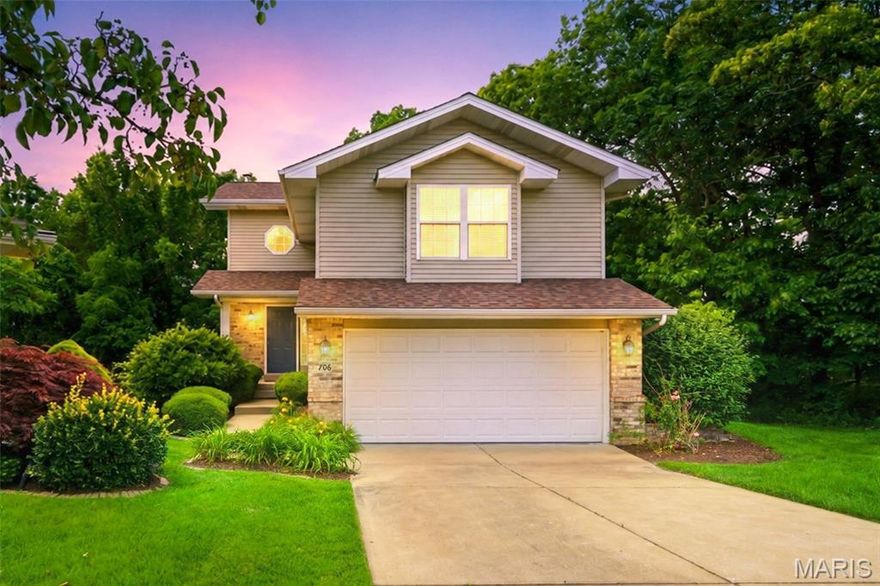 Welcome home to this beautifully maintained Lake St. Louis property offering over 2,200 square feet of finished living space, low-maintenance living, and access to all the outstanding Lake St. Louis amenities. Tucked away on a quiet cul-de-sac and surrounded by mature trees, this home provides both privacy and plenty of space for everyday living and entertaining. A two-story entry foyer welcomes you inside and opens to the inviting family room featuring a gas fireplace, abundant natural light from oversized windows, and a French door leading to the composite deck overlooking the wooded backdrop. The well-appointed kitchen is sure to impress with light cabinetry, granite countertops, stainless steel appliances, a gas range, and a pantry for additional storage. Just a few steps up, you'll find a spacious bedroom with a large walk-in closet and an adjoining full bath. The upper level features a generous primary suite complete with a walk-in closet and private bath with dual sinks, along with a third bedroom that also offers a walk-in closet. Convenient second-floor laundry adds to the home's functionality, and the washer and dryer are included. Need even more living space? The finished lower-level recreation room is the perfect gathering spot, featuring a full bath, storage area, and walkout access to a private patio surrounded by nature. Enjoy a carefree lifestyle with lawn care, landscaping, and snow removal provided by the association. Plus, take advantage of all the recreational amenities Lake St. Louis has to offer. Major updates provide peace of mind, including the roof, HVAC system, and water heater—all less than five years old.