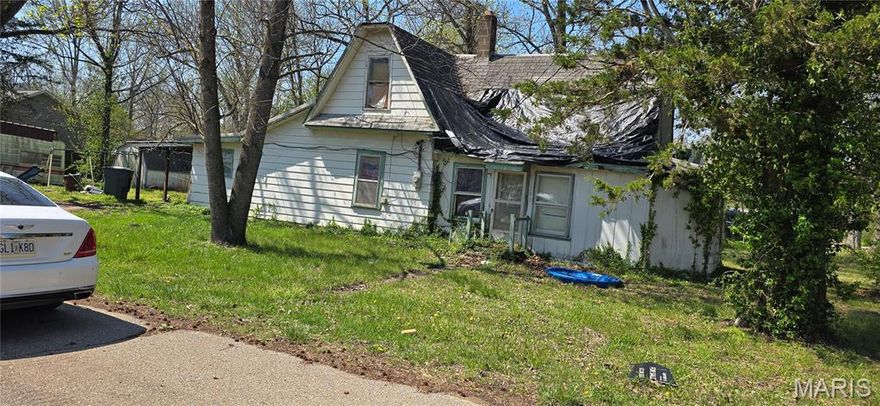 Investors, are you looking for a place to grow your portfolio? The possibilities are endless. These two lots have one home with 2 bedrooms and 1 bath. The home holds no value; this property is listed at a very reasonable price. Scoop this one up soon!