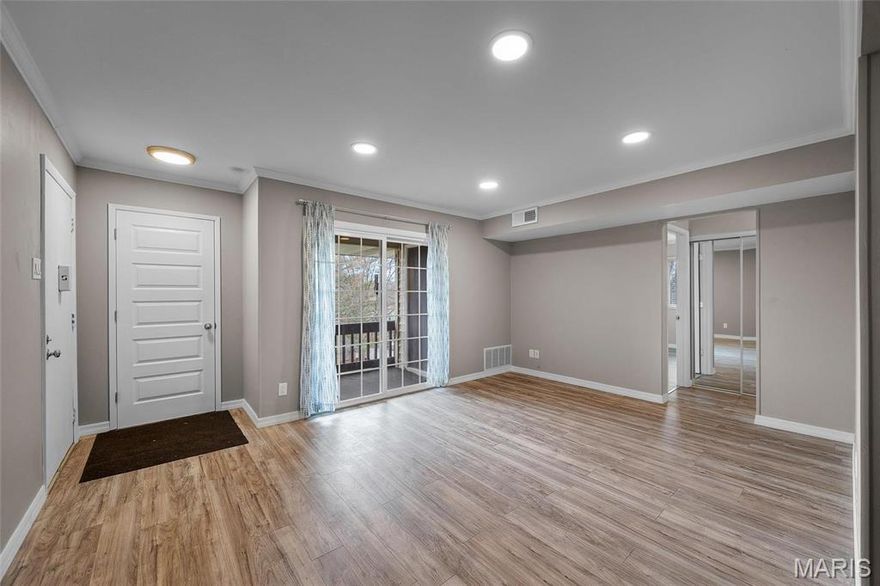 Enjoy this renovated two bed, one bath condo. This is low maintenance living at its best! Details...Details...Lots of all new items down to vent covers and doorknobs.  There is luxury wood plank flooring, all new designer doors and crown molding throughout. Kitchen features all new cabinets, granite countertops, new sink with new disposal, neutral backsplash and a pantry too! Don't forget to take a look at the all-new stainless steel appliances to include a specialty dishwasher and icemaker. Large 15x11 Primary Bedroom with large closet with built in shelves. New wood blinds and fans in all bedrooms. You will find additional storage in the large 4x4 closet in the hallway as well as optional storage overhead in the crawl space. Livingroom is 16x12 with added can lighting and a closet in the entry way. Complete unit has been remediated fo Copper wiring, hardwired smoke detectors. Location: Interior Unit