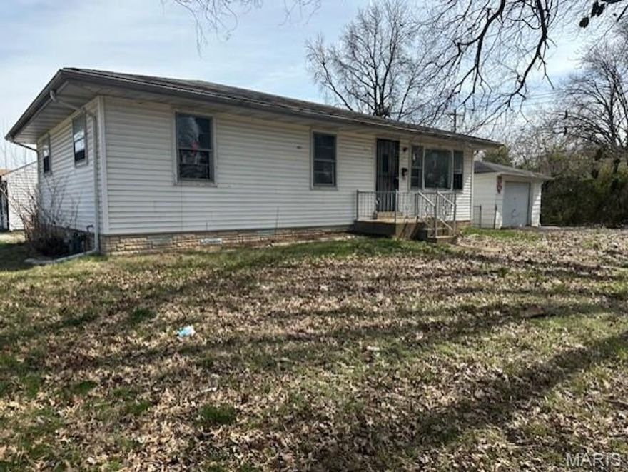 SOUTH OF CHAMBERS! Calling all investors! This is the project you've been looking for! not too needy, and for the price and features, you can have this beauty up and running in no time. 3 bedrooms, Oversized garage, full partial finished basement. All systems in place! Hurry on this one! It should have interest.