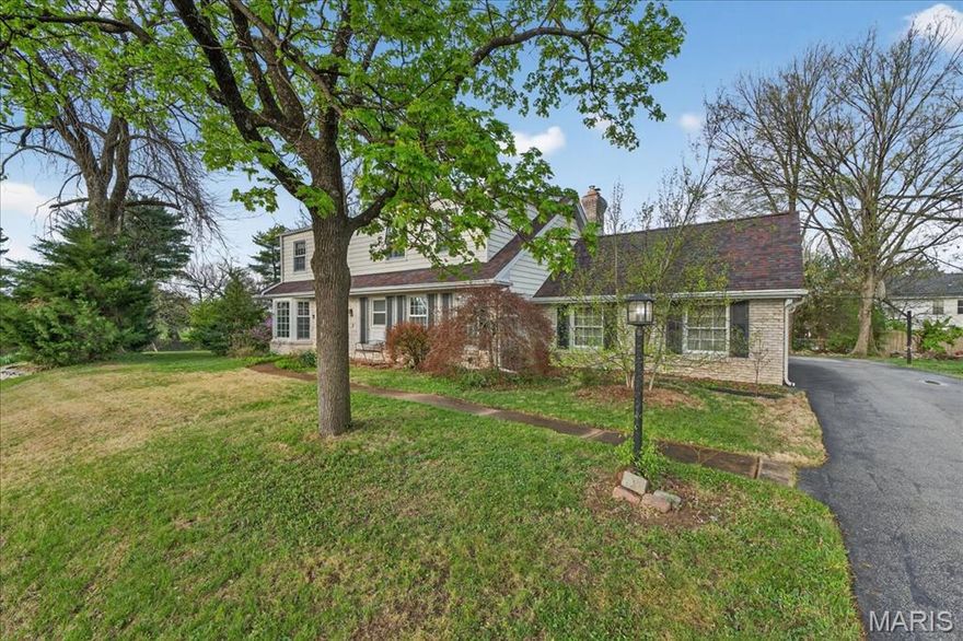 Space, Character & an Exceptional Glendale Location

Don’t let the charming exterior fool you—this Glendale home offers expansive living, distinctive character, and a location that’s hard to beat. Ideally positioned between two premier country clubs and just moments from Mary Queen of Peace, this 4-bedroom, 3.5-bath residence delivers both lifestyle and flexibility.

Inside, newly refinished floors set the tone across the main level. A dramatic vaulted family room with rich built-ins creates an inviting space for everyday living and entertaining alike. The updated kitchen is truly one-of-a-kind, featuring stainless appliances and a remarkable 18th-century French baker’s counter—an unforgettable focal point. Just beyond, the hearth room with custom built-ins and a Forshaw gas fireplace offers a warm, connected gathering space.

A rare main-floor bedroom suite with full bath provides ideal flexibility for guests, in-laws, or multigenerational living. Formal living and dining rooms complete the main level.

Upstairs, the spacious primary suite includes two walk-in closets, while two additional bedrooms offer comfortable accommodations for family or guests.

The largely finished lower level has additional built-ins, a half-bath and is ready for recreation, with a pool table and air hockey table that can be included with the home. There is also room for storage and a large workshop area.

In the backyard, enjoy two patios, a built-in gas grill, and beautifully landscaped grounds accented by distinctive Niagara Escarpment stone walls and vibrant azaleas. The rear-entry, attached, 2-car garage has a large parking pad that, with the driveway, can accomodate up to five vehicles.

All of this just minutes from I-44 and served by highly regarded schools. This is a rare find in this location. Book your tour before this gem is off the market.
