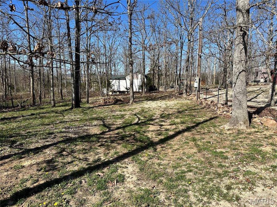 Lot for sale at Lake Hanna! Your camping and fishing get away! Enjoy access to Lakes, Common areas, Playgrounds, pavilions, shower houses. Call for more information today.