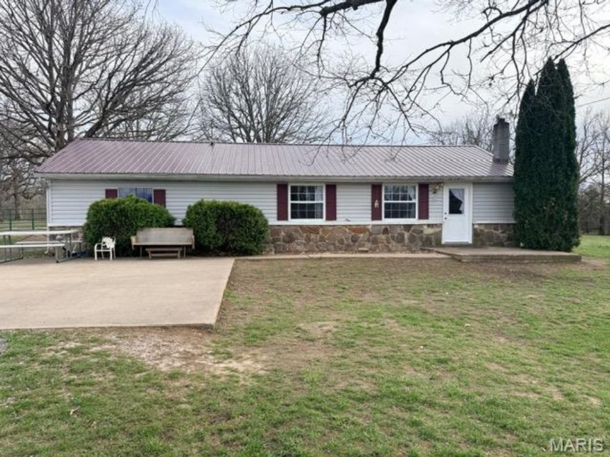 Enjoy the best of country living with this well-maintained 3 bedroom, 1 bath home situated on 10 beautiful acres. The property is fully fenced and cross-fenced, making it ideal for livestock or horses, and includes a horse barn perfect for a hobby farm setup. A separate outbuilding offers great potential and could easily be converted into a mother-in-law suite or guest quarters. The spacious yard provides plenty of room to relax and enjoy the peaceful surroundings, while abundant wildlife adds to the charm of this rural retreat. If you’re looking for privacy, functionality, and a move-in ready property, this one checks all the boxes!