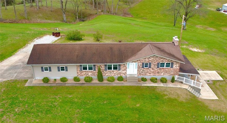 This one checks a lot of boxes. Three-bedroom ranch on nearly 3 acres in Perryville, Missouri — with a walk-out basement that's fully set up as a second living space complete with its own updated kitchen, granite countertops, gas fireplace, full bathroom, and a large open family room.

The main level is just under 1,600 square feet with an updated kitchen, quartz countertops, and main-level laundry — which, if you've ever hauled laundry up and down stairs, you know that's a big deal. Attached garage, plus a really nice outbuilding out back for all the tools, toys, or projects you've been running out of room for.

The walk-out basement is the kind of setup people search a long time for — whether you're thinking in-law suite, multigenerational living, or just serious bonus space, it's already there and ready to go.

And the land — just under 3 acres gives you room to breathe, garden, or just enjoy some actual privacy.
The current owners have called this home for over 40 years. That kind of history says a lot. Come see it for yourself.