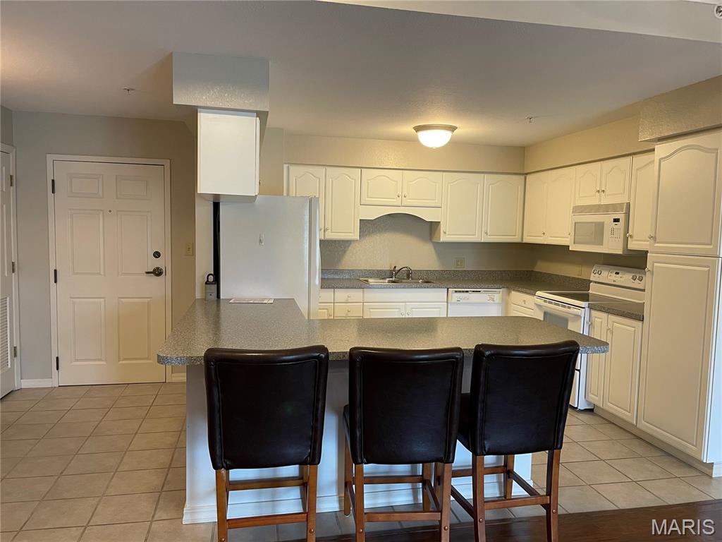 Maingate Condominiums - Residential
