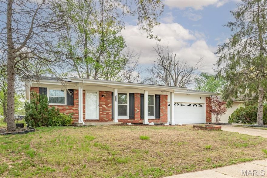This move-in ready 3-bedroom, 2-bathroom home features a functional open-concept layout that flows seamlessly through the main living areas, complemented by a completely renovated kitchen featuring dovetailed, soft closing white shaker cabinets, granite countertops, new luxury vinyl tile and brand-new appliances, perfect for creating culinary masterpieces. the primary suite is spacious and has an en suite bath. Fresh paint adorns every corner, revitalizing the interior and exterior with a vibrant appeal. Throughout the home, gleaming hardwood floors add an air of elegance and sophistication, creating a seamless ambiance from room to room. The attached two-car garage, ensuring your vehicles are always sheltered from the elements. Outside, a partially fenced level yard with a charming brick patio for outdoor relaxation and warm weather entertainment. Additional updates, include the water heater, PVC sewer stack, some newer windows, newer electrical service and panel.