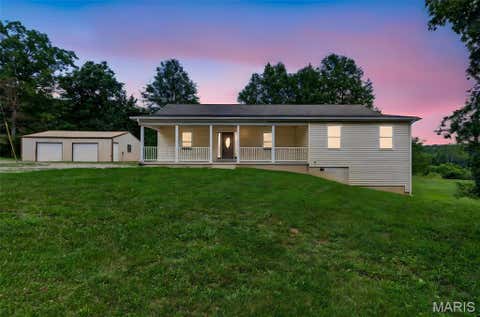 Photo of 9536 Three Oaks Ln LN, Bloomsdale, MO 63627 (MLS # 26040045)