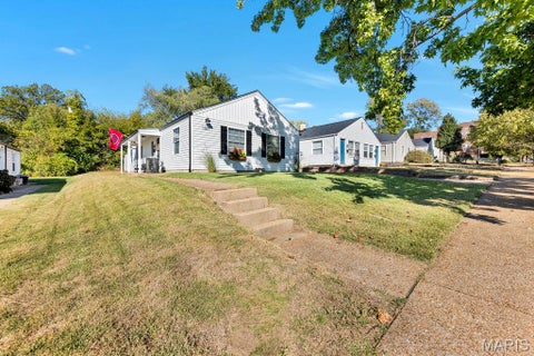 Photo of 1221 Louisville Avenue, St Louis, MO 63139 (MLS # 26064232)