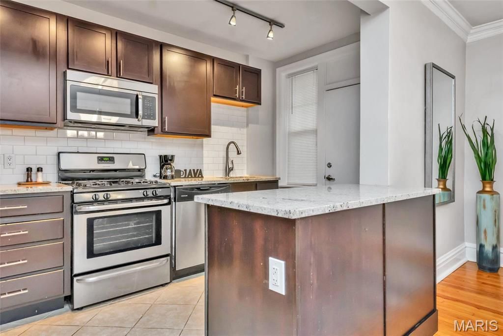 Photo of 7557 Buckingham, St Louis, MO 63105 (MLS # 26020351)