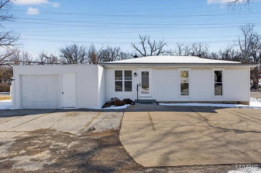 Tired of renting office space or dreaming of showcasing your own business? This newly remodeled commercial property is ready to welcome a small business home. Ideally located on highly visible and heavily traveled Jungermann Road in the heart of St. Peters, this space offers excellent exposure and convenience. Property was used as a Chiropractic Office and would make a great Dog Grooming Spa, Hair Salon or Therapist, Insurance and Accounting Offices. Step inside to an inviting lobby filled with natural light, LED lighting, and durable LVP flooring throughout. A new subfloor has been installed in the lobby, bathroom, and office. The thoughtfully designed layout features a stylish reception desk, main-floor storage area, private office, and half bathroom. An additional hand-washing sink, and public half bathroom providing both functionality and separation between 2 office workspaces. The property offers nine parking spaces plus a detached, enclosed one-car garage for added storage or parking. The unfinished basement provides a clean slate, complete with plumbing for a full bathroom and the potential to add a washer/dryer and kitchenette. With endless possibilities, this is a fantastic opportunity to create a space tailored to your business needs.