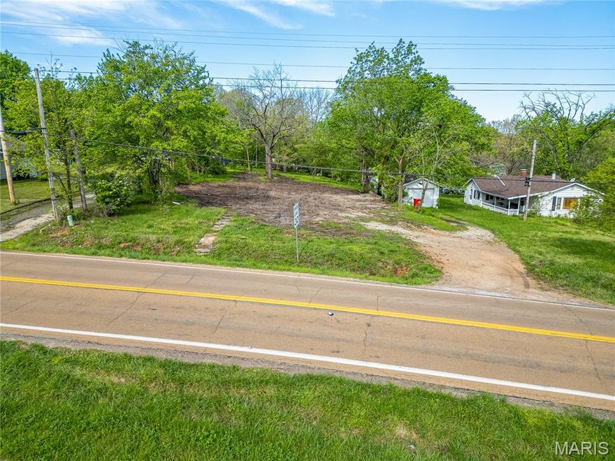 Positioned on a .39 acre lot along a well-traveled commercial street, this property offers excellent visibility and versatility for a variety of uses. With public utilities available, it’s ready for your next project whether you're considering a business location, investment opportunity, or even a residential build. The flexible zoning allows for both commercial and residential use, making it a great option for those looking to maximize potential in a convenient in-town location. Buyer to perform their own due diligence regarding utilities, zoning, and permitted uses.