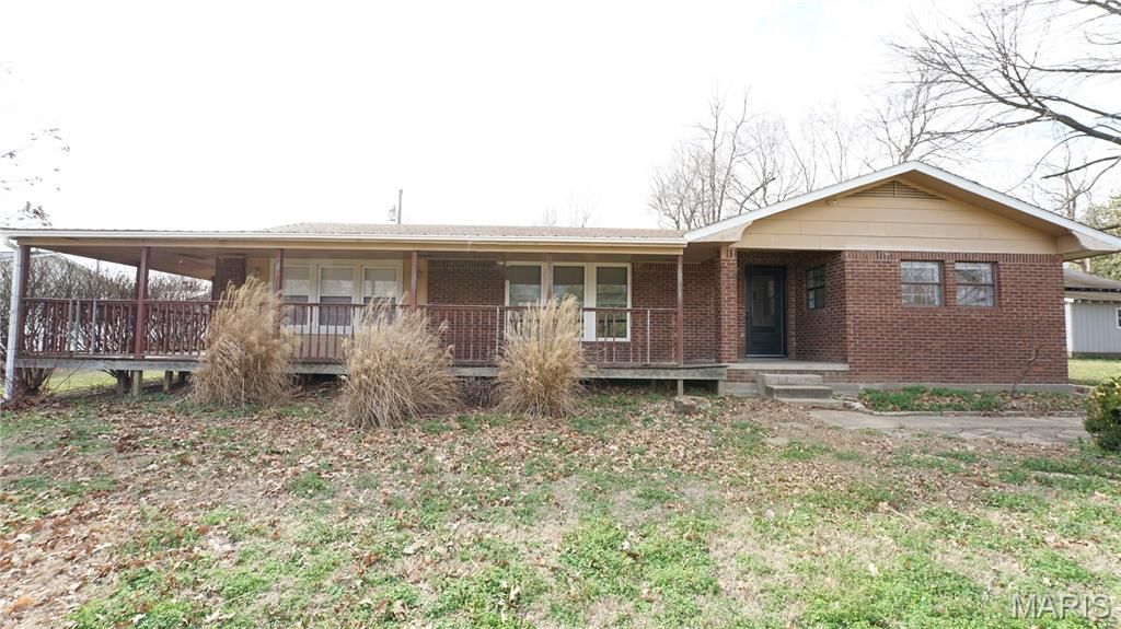 Photo of 306 N Miller St St, Bloomfield, MO 63825 (MLS # 26013324)