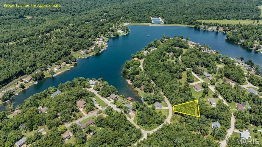 Discover the perfect opportunity to build your dream home, weekend retreat, or future investment property in the heart of Terre du Lac, a private lake community just minutes from Farmington and less than 90 minutes from St. Louis. This undeveloped lot is ideally located on a quiet street and offers convenient access to community-maintained roads and nearby utilities, making your build process even smoother.

As a property owner in Terre du Lac, you’ll have access to an incredible array of amenities, including 16 private lakes ideal for fishing, boating, kayaking, and swimming. Enjoy two golf courses, multiple parks, tennis courts, a country club, and more, all within the same vibrant community. Whether you're planning to build now or hold the lot for future use, this is a fantastic opportunity to enjoy the lifestyle Terre du Lac is known for.

This lot is a great fit for those looking to enjoy a laid-back, outdoor-focused lifestyle surrounded by natural beauty. Come explore all that this unique development has to offer and imagine the possibilities.