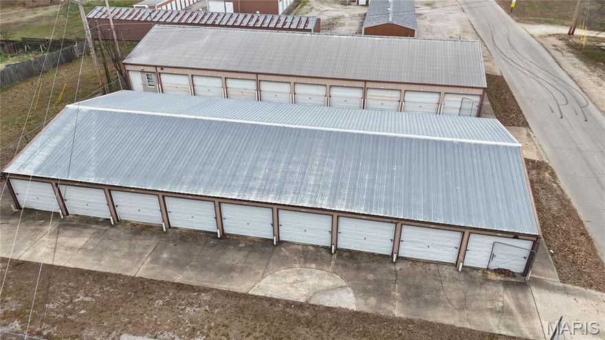 Income-producing property featuring 41 storage units bringing in approximately $2,200 per month, a type of property that is rarely available for purchase. The property also includes an on-site office space and a 2 bedroom, 1 bathroom house currently rented for $475 per month. With multiple sources of rental income, this property presents a solid investment opportunity. Call today before gone tomorrow!!