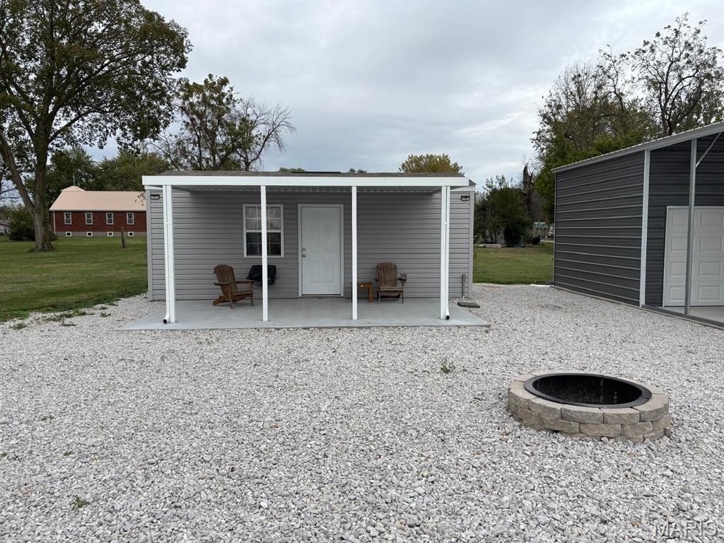 Photo of 210 N 3rd Street, Hunnewell, MO 63443 (MLS # 26026434)